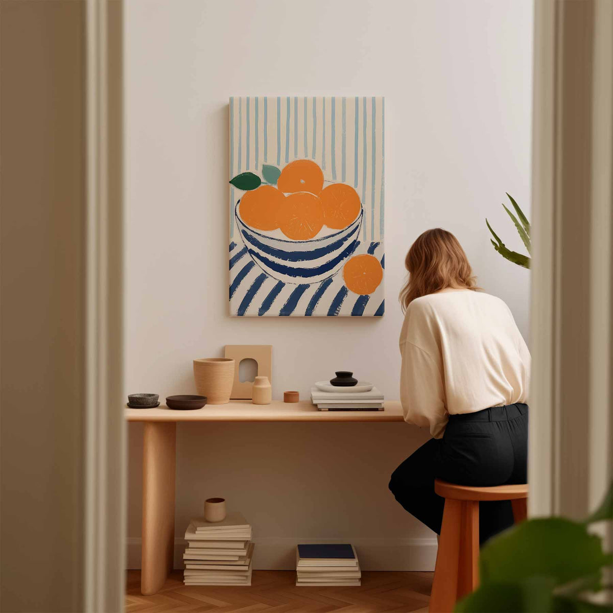 Blauwe kom met sinaasappels op gestreept tafelkleed – canvas kunstwerk als wanddecoratie