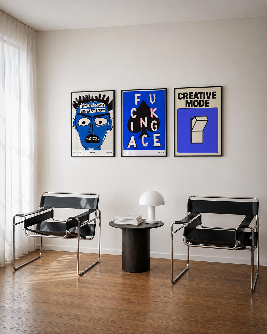 Kleurvlakken driedelige posterset – deze posterset toont een blauw gezicht met zwarte lijnen en