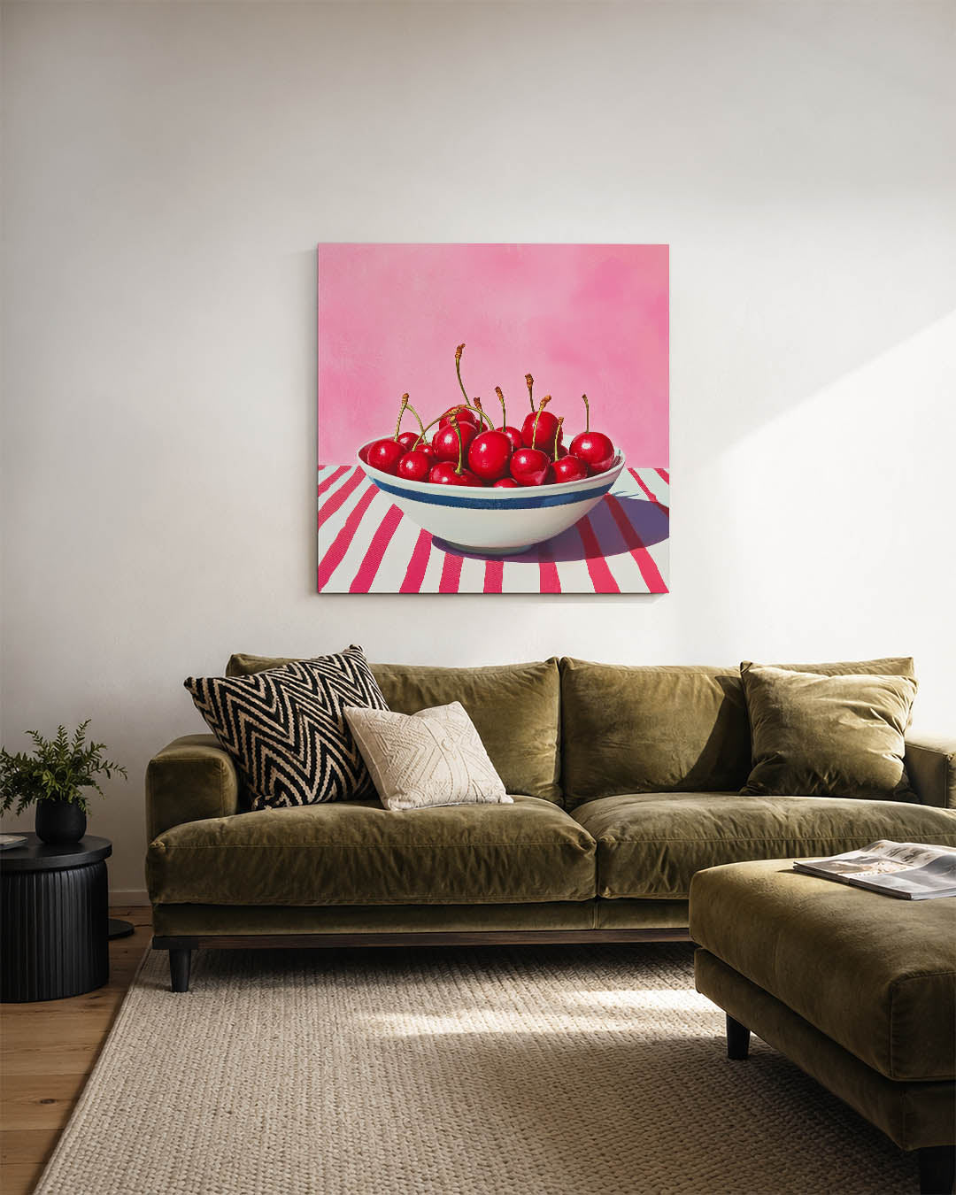 Kersen in kom kunstwerk – sfeerbeeld – dit werk toont een kom vol glanzende kersen tegen een roze achtergrond. De compositie