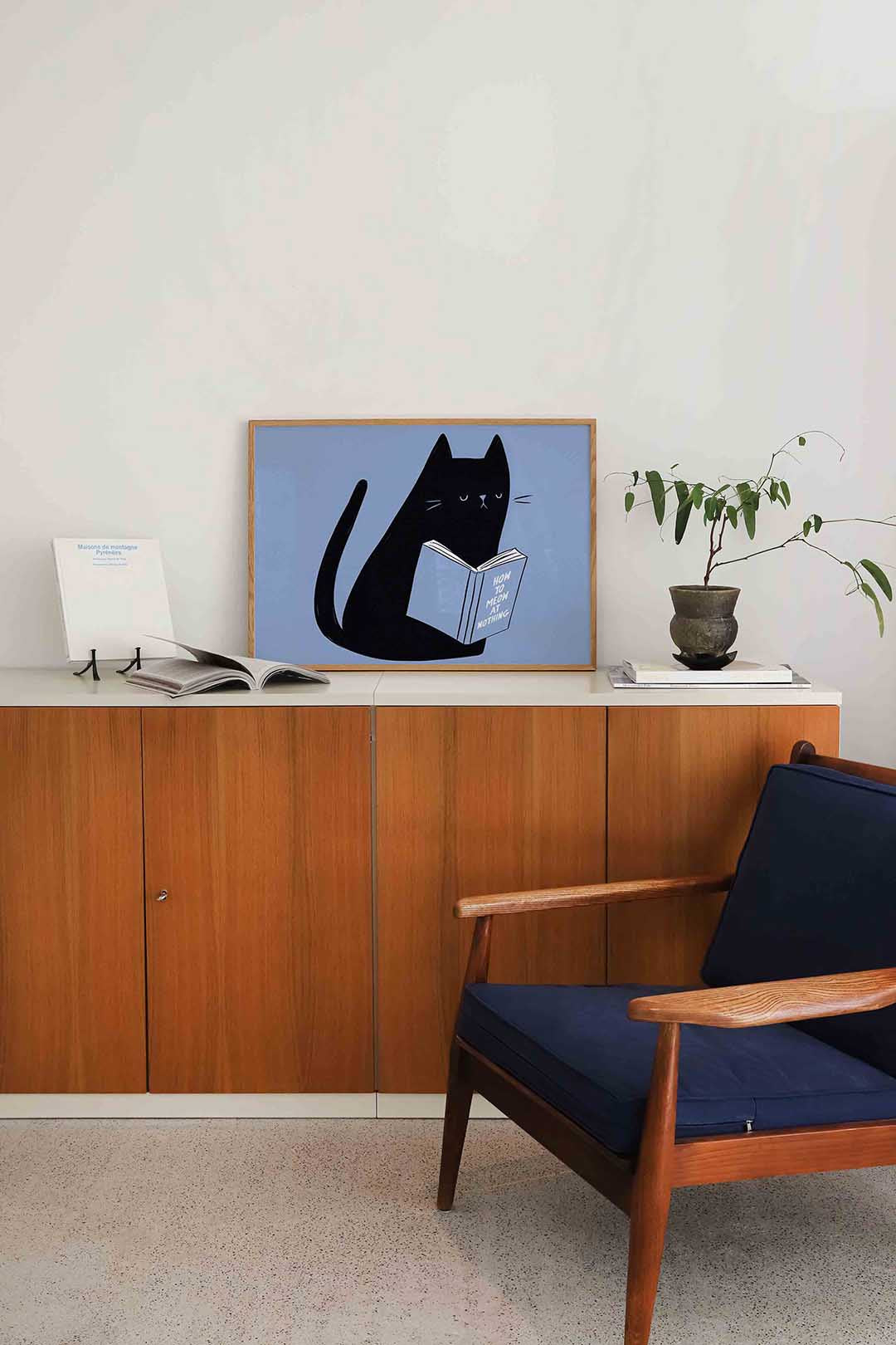 Zwarte kat met boek – moderne landscape wanddecoratie van WallArtistic