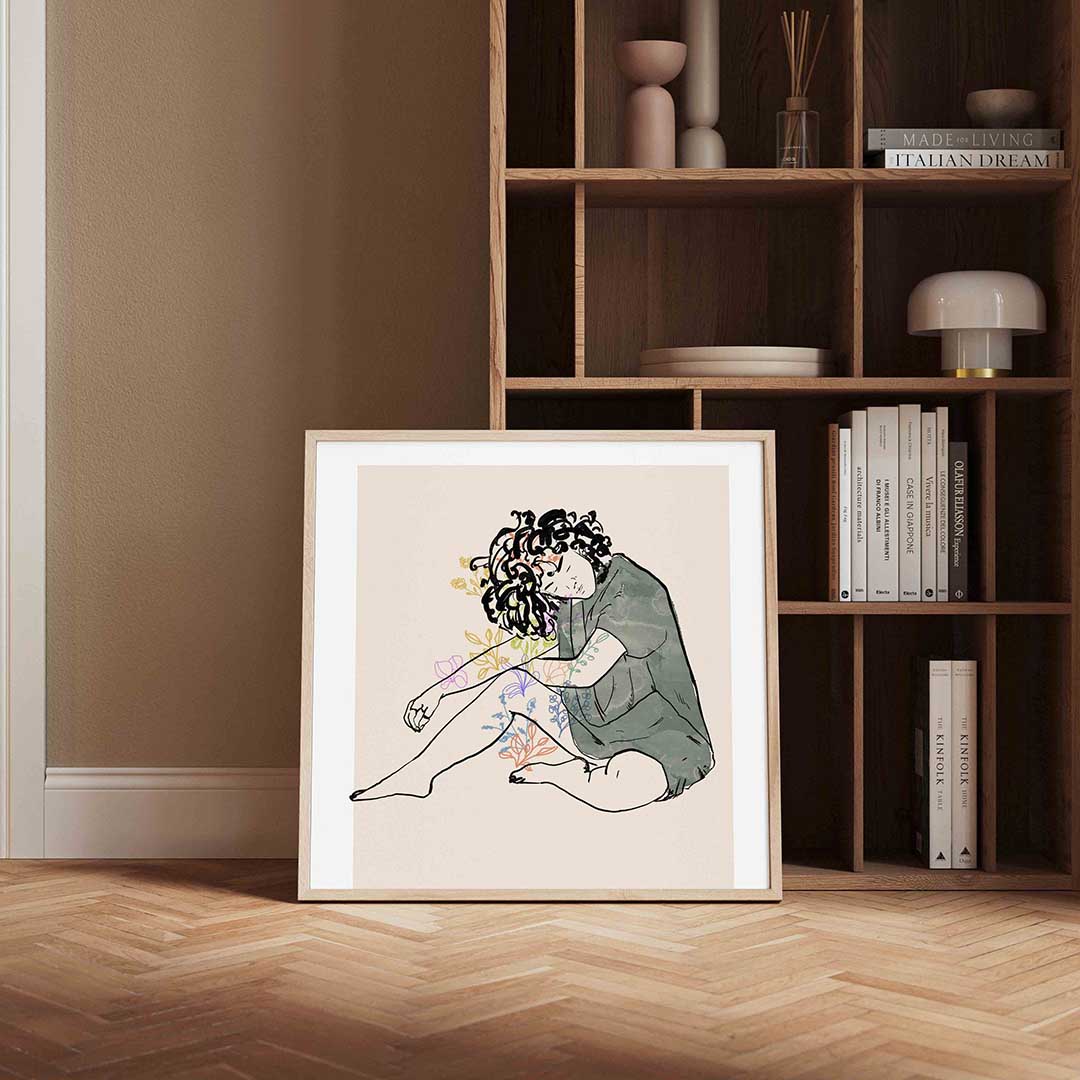 Zittende figuur met bloemen – vierkante wanddecoratie met kleur en vorm van WallArtistic