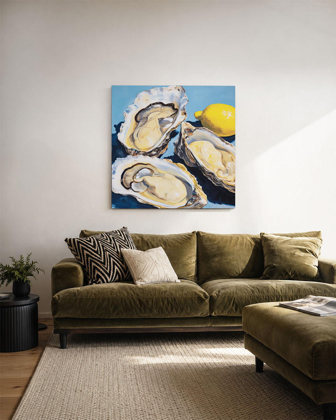 Oesters en citroen kunstwerk – derde productweergave – dit werk toont drie oesters en een citroen op een blauwe achtergrond.