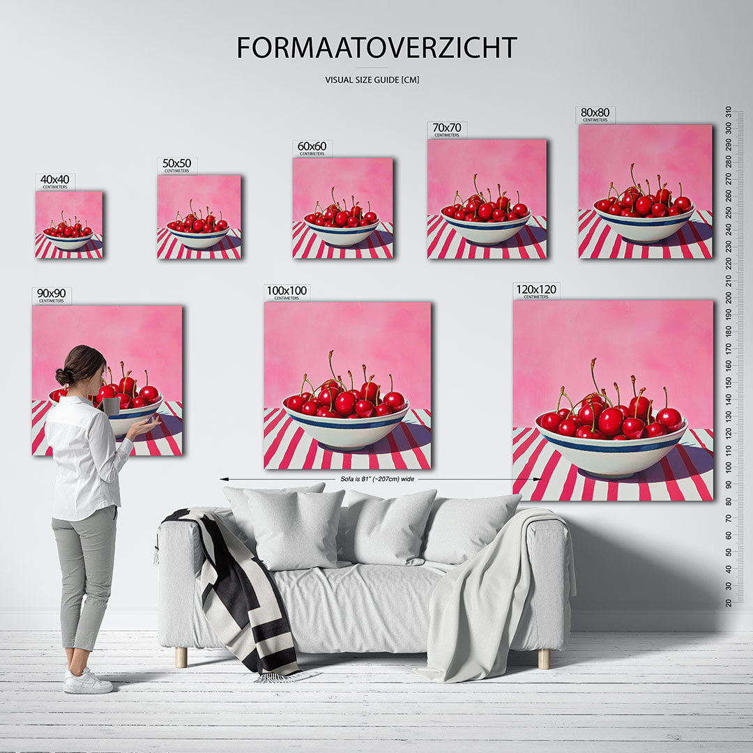 Kersen in kom kunstwerk – dit werk toont een kom vol glanzende kersen tegen een roze achtergrond. De compositie is levendig