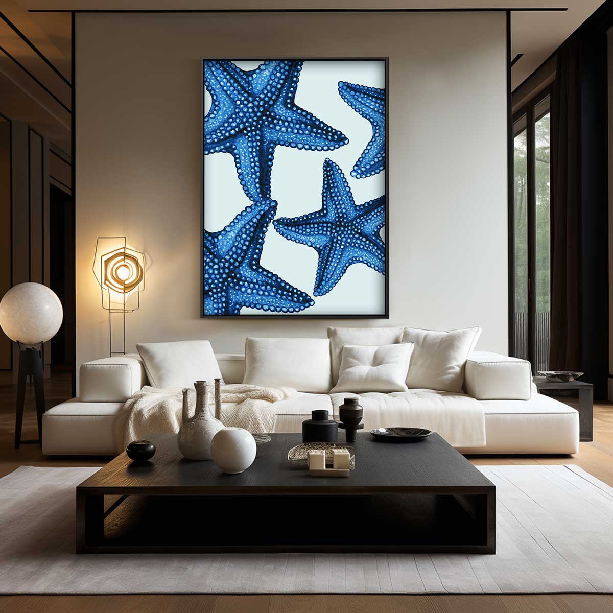 Blauwe zeesterren – kunstwerk met zwarte baklijst