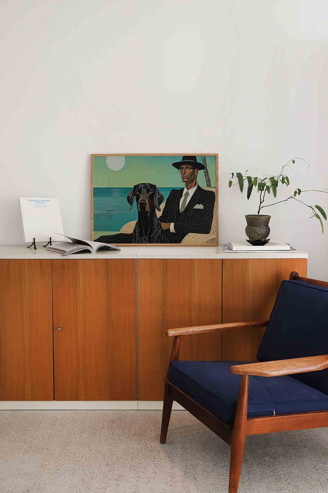 Man en hond bij zee – liggende dieren wanddecoratie van WallArtistic