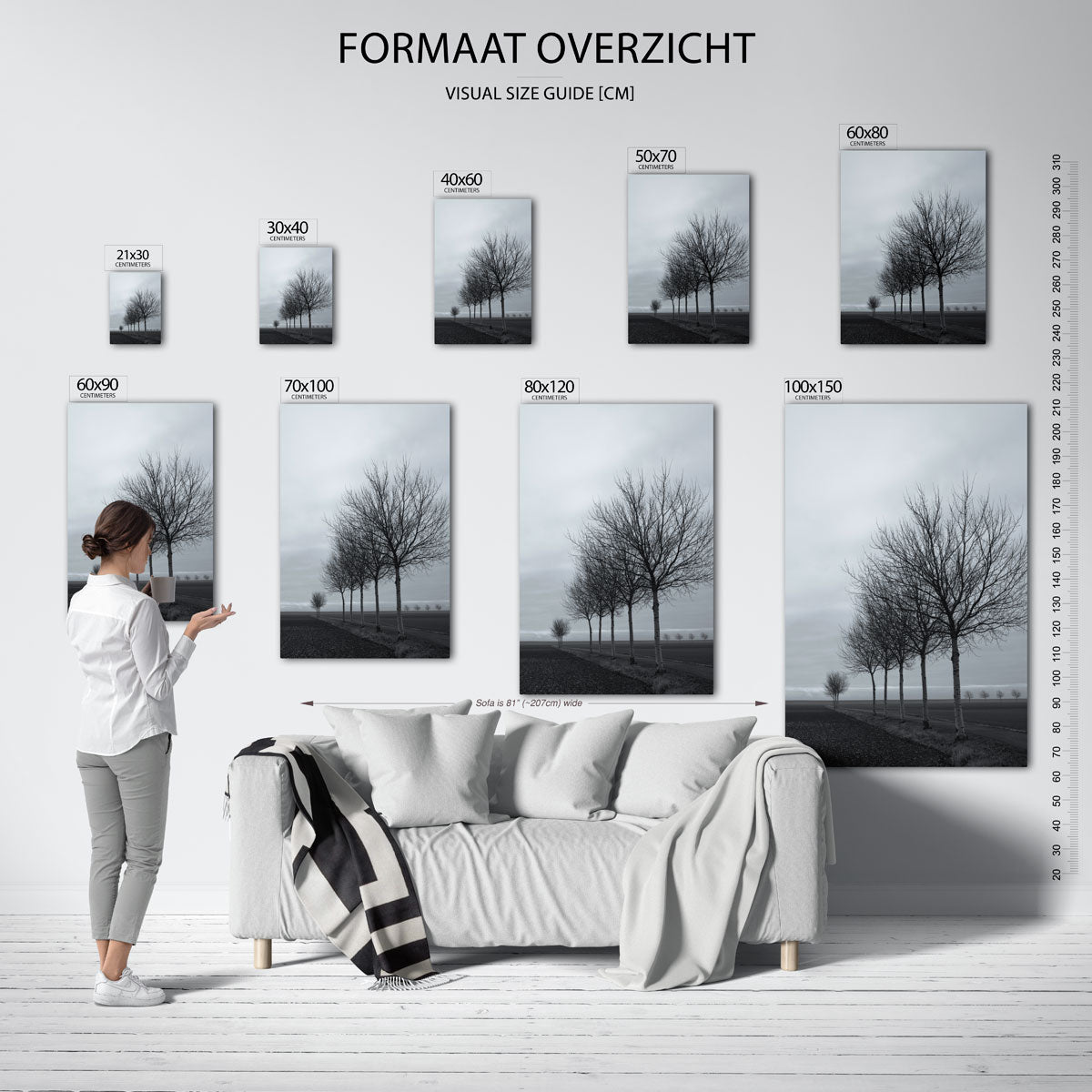 Landschap met bomenrij poster – sfeerbeeld – een rij kale bomen langs een weg in een open landschap. De lucht is bewolkt en