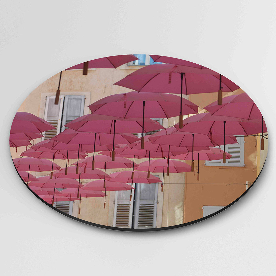 Roze paraplu's – muurcirkel fotografie als moderne wanddecoratie
