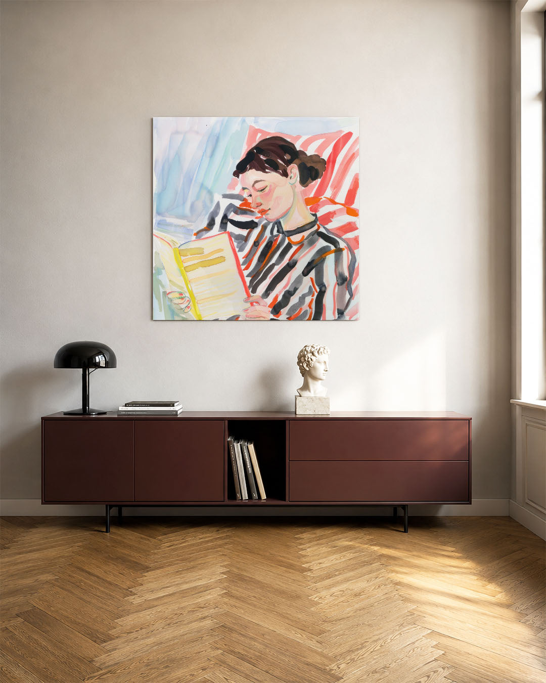 Lezende vrouw kunstwerk – tweede productweergave – dit kunstwerk toont een vrouw verdiept in een boek, omgeven door levendige