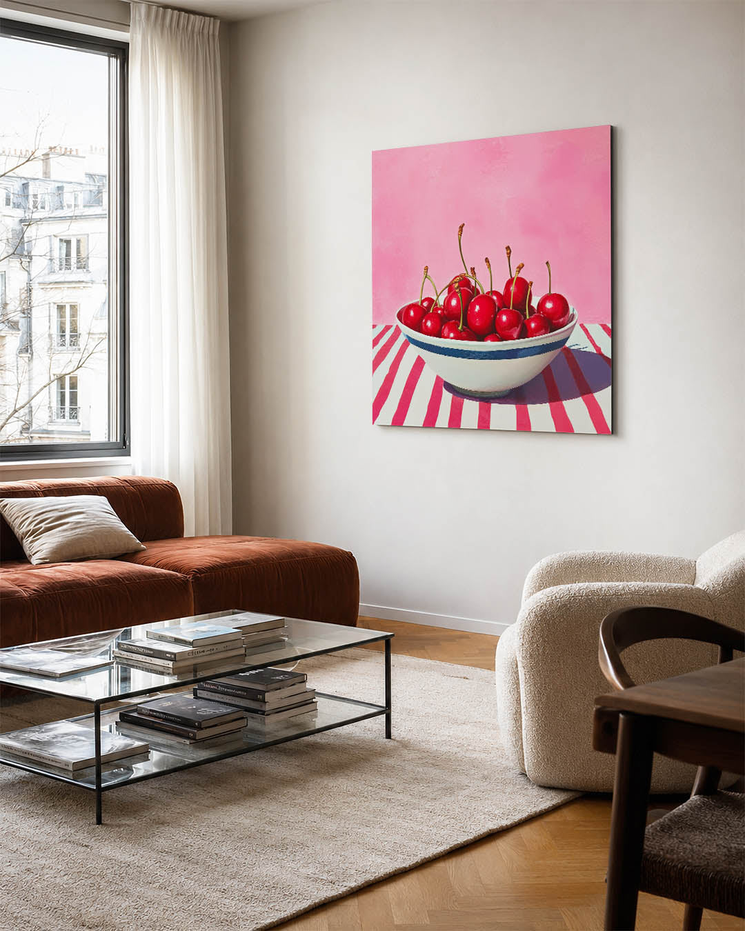 Kersen in kom kunstwerk – vierkante wanddecoratie – dit werk toont een kom vol glanzende kersen tegen een roze achtergrond.