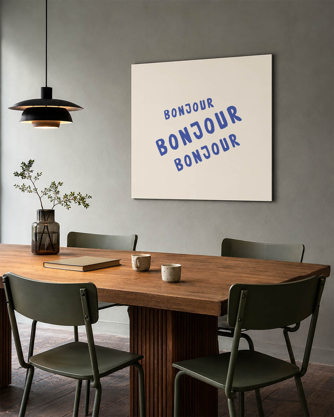 Typografie kunstwerk – tweede productweergave – dit werk toont het woord 'Bonjour' driemaal in blauwe letters op een beige