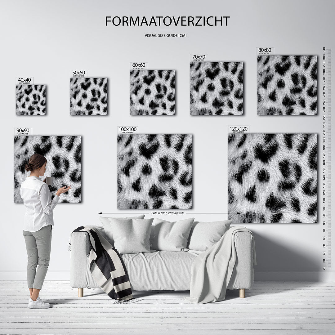 Dierlijke patronen kunstwerk – dit werk toont een dynamisch patroon van zwarte vlekken op een witte achtergrond, met een