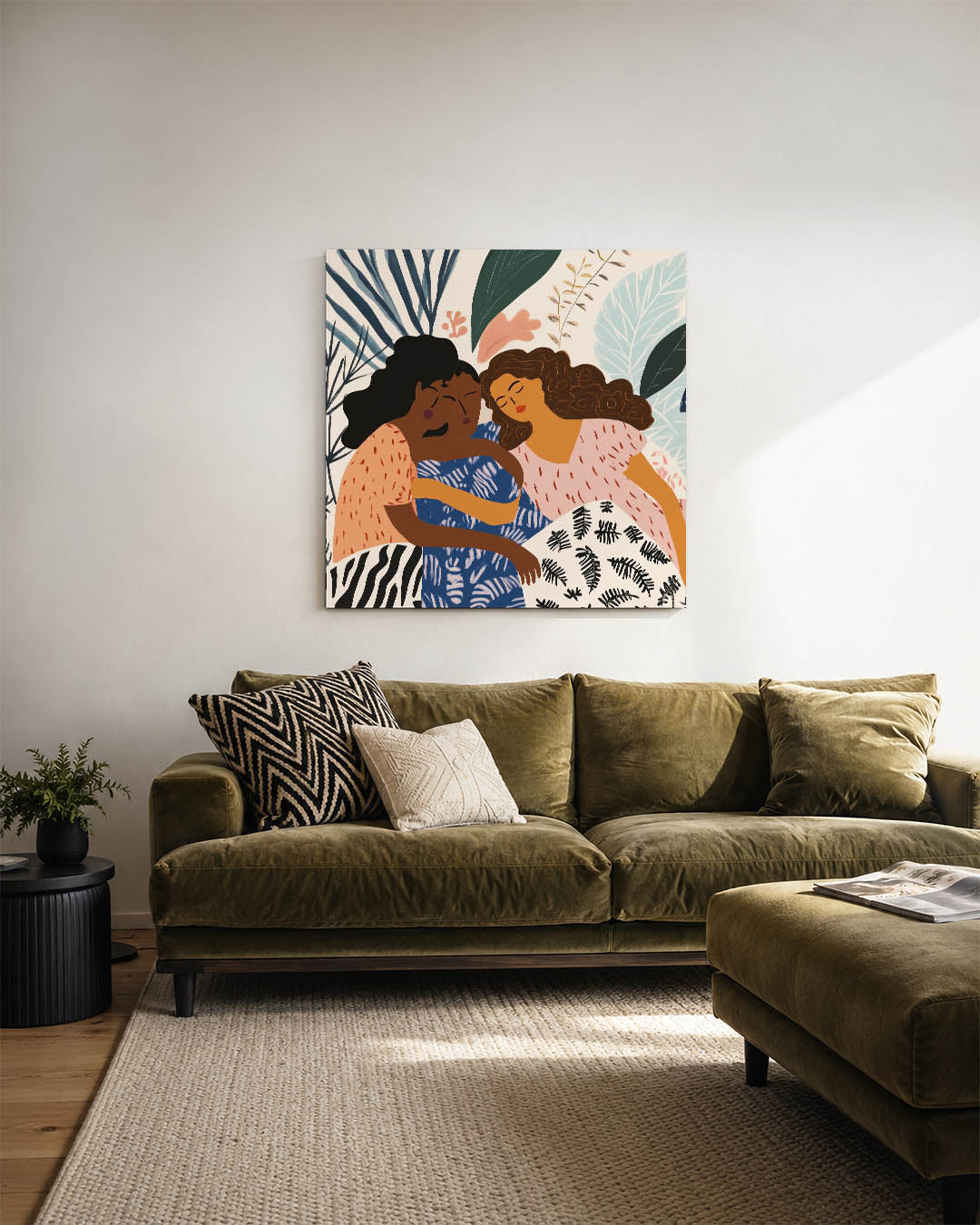Vriendschap en natuur kunstwerk – sfeerbeeld – dit kunstwerk toont drie figuren in een omhelzing, omringd door bladeren en