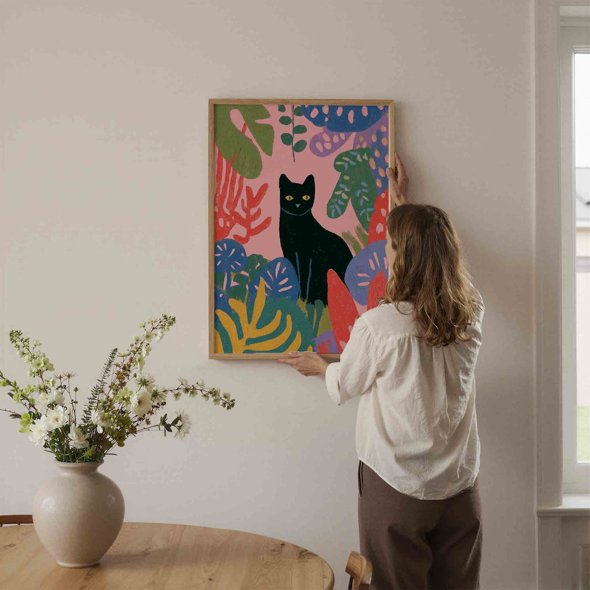 Zwarte kat en bladeren – botanische wandkunst als portret poster